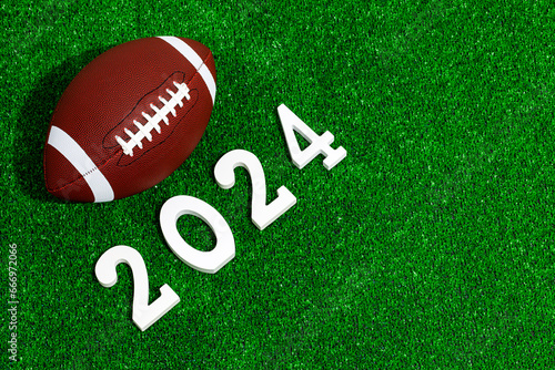 American football ball next to 2024 number
