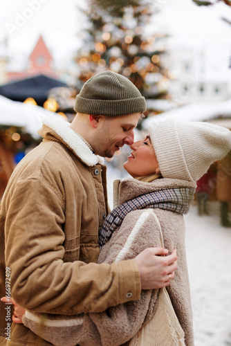 Beautiful portrait of couple at the christmas market