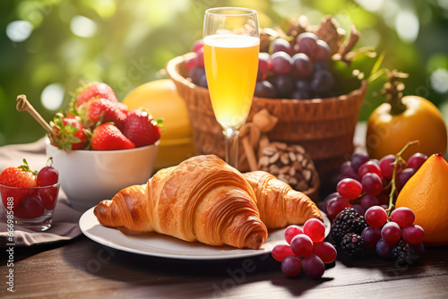 Enjoying brunch or breakfast on New Year's Day, typically featuring croissants, mimosas, and other brunch delicacies