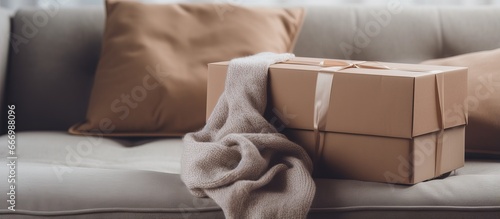 Cashmere sweater in box on sofa