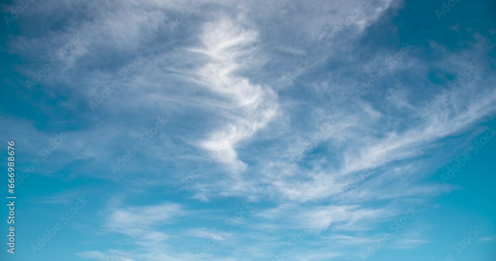 Timelapse Blue sky fluffy white clouds on summer season bright clear skyline with beautiful cloudscape. Timelapse Panorama blue sky clouds heaven on daylight with copy space. Cloudscape sunny day. Timelapse Blue sky fluffy white clouds on summer season bright clear skyline with beautiful cloudscape. Timelapse Panorama blue sky clouds heaven on daylight with copy space. Cloudscape sunny day.
