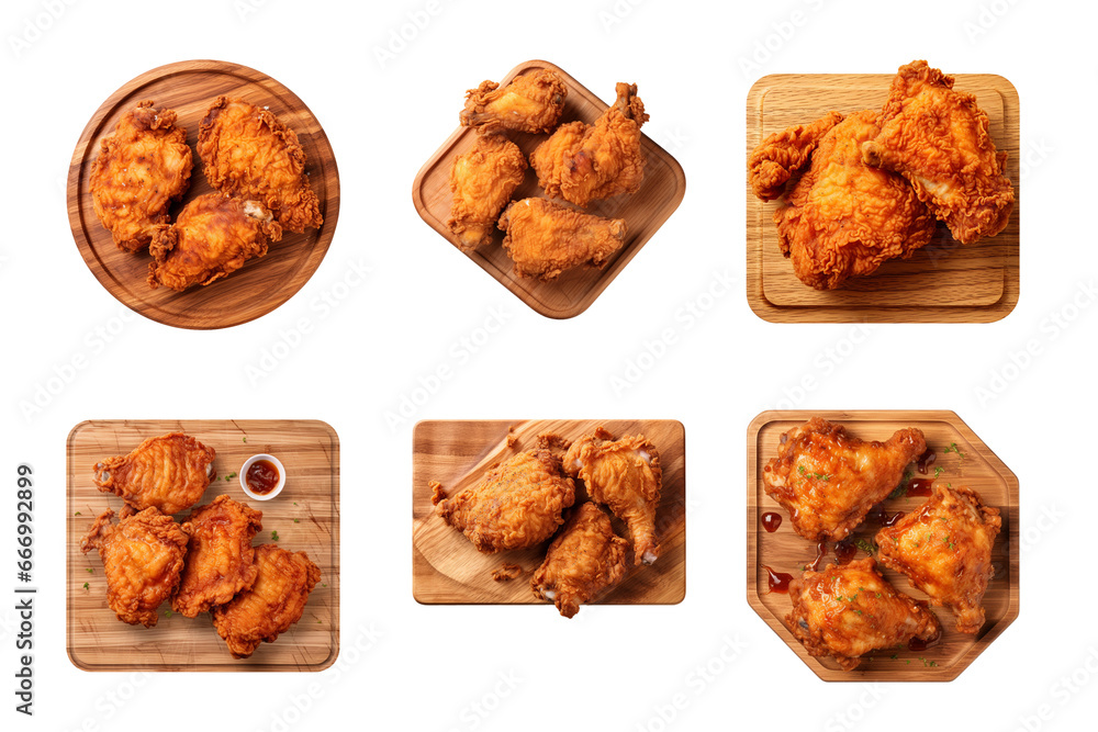 collection of crispy fried chicken on a wooden cutting board isolated on a transparent background, cut out collection of crispy fried chicken on a wooden cutting board isolated on a transparent background, cut out