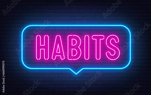Habits neon neon sign in the speech bubble on brick wall background.