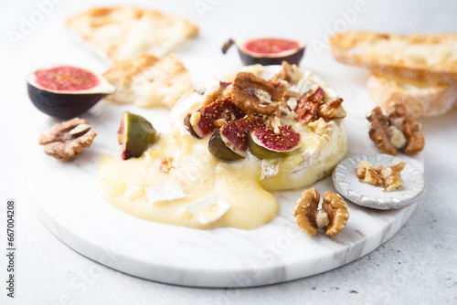 Baked camembert cheese with figs and honey