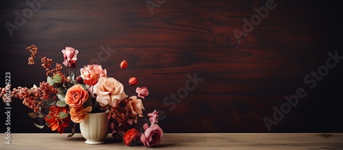 Plastic blossoms adorning caf s wooden surface photo