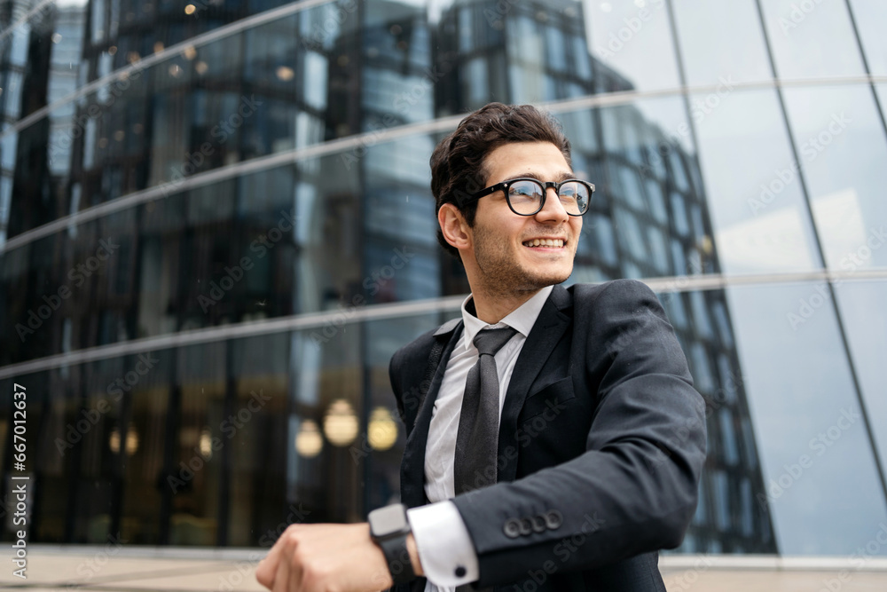 Portrait of a hurrying manager happy going to work in a new office every day routine. A young confident lawyer agent in real estate glasses in business clothes. Portrait of a hurrying manager happy going to work in a new office every day routine. A young confident lawyer agent in real estate glasses in business clothes.