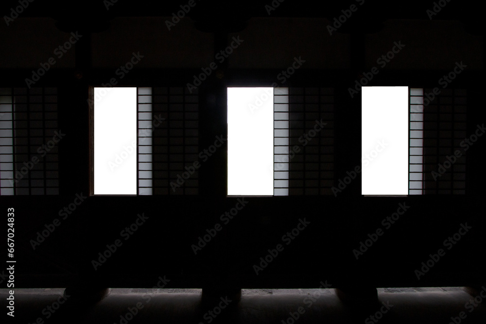 Abstract Windows of a traditional Japanese house, silhouetted image, with a white background in the middle. Abstract Windows of a traditional Japanese house, silhouetted image, with a white background in the middle.