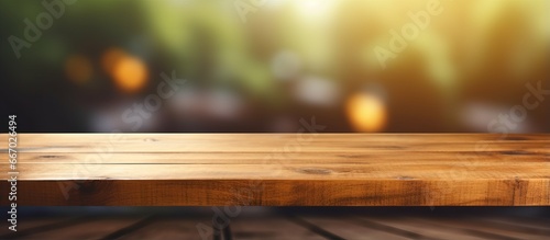 Close up shot of a wooden table with blurred background
