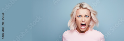Angry woman screaming. Human emotions, facial expression concept photo