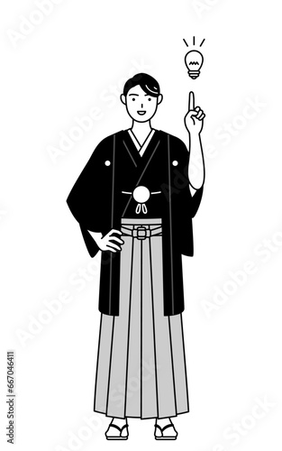 アイデアを思いついた紋付袴姿の男性