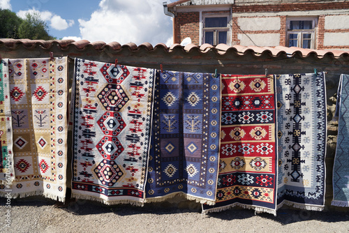 Georgian rugs hanging
