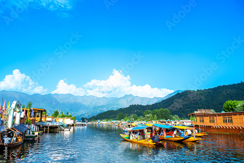  Dal Lake and the beautiful mountain range in the background, in the summer Boat Trip, of city Srinagar Kashmir India. photo