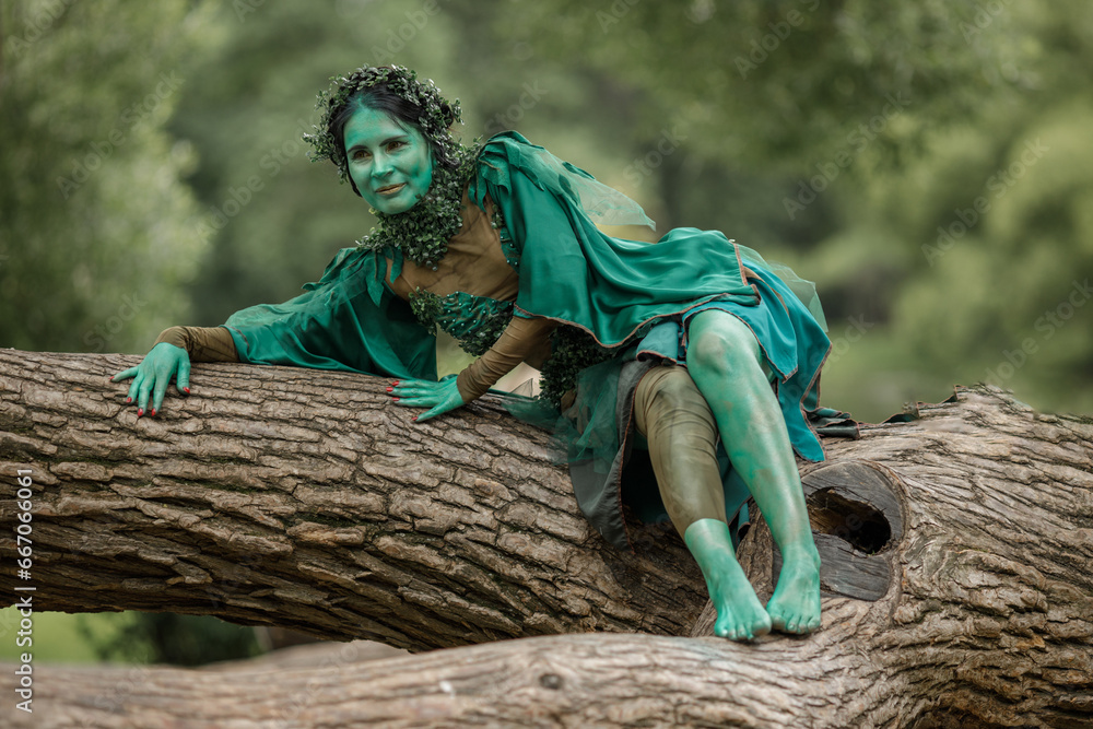 Ταπετσαρία A mystical green dryad in the forest in the background