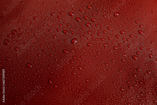 water drops on red brown leather texture  soft focus close up pattern