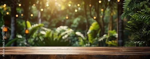 Naturally beautiful. Empty wooden table in sunlit garden. Rustic charm. Wood desk with bright outdoor background. Green serenity in park