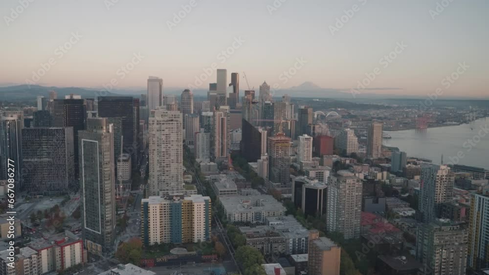 Seattle Washington Cityscape Skyline Skyscrapers and Mount Rainier on Background during Sunset Seattle Washington Cityscape Skyline Skyscrapers and Mount Rainier on Background during Sunset