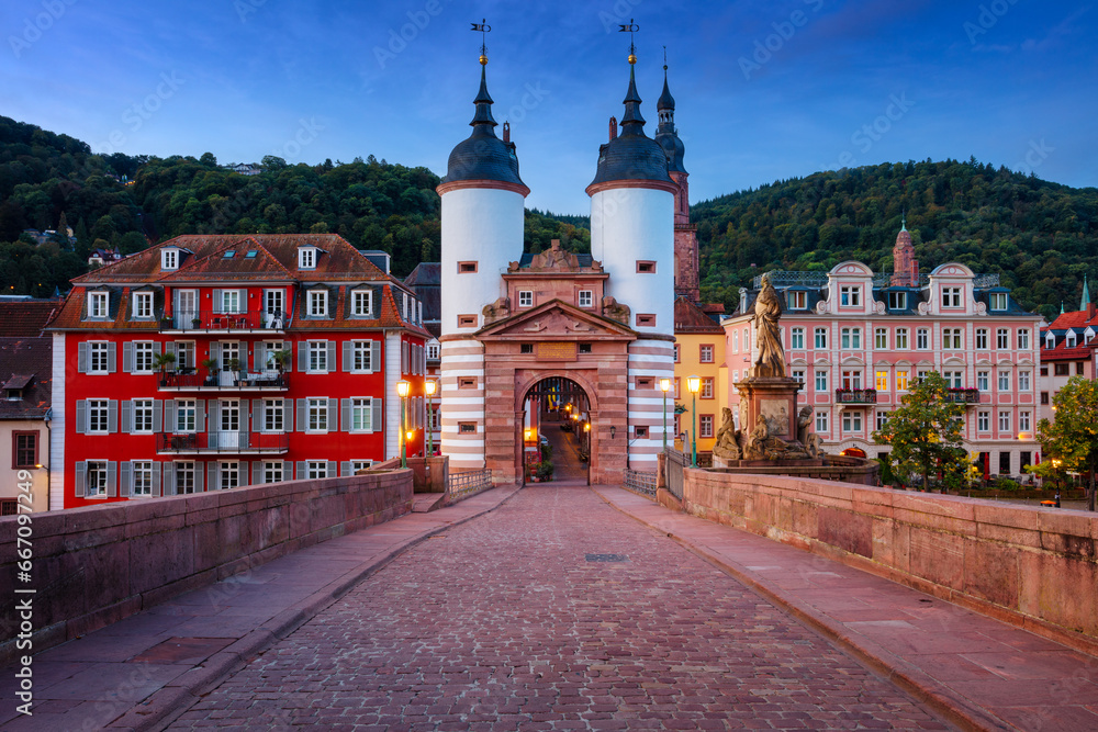 Heidelberg, Germany. Cityscape image of historical city of Heidelberg, Germany with Old Bridge Gate at autumn sunrise.