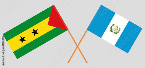 Crossed flags of Sao Tome and Principe and Guatemala. Official colors. Correct proportion