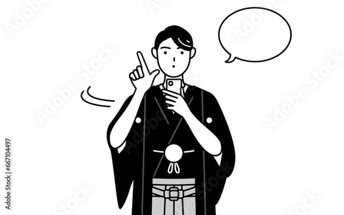 Man wearing Hakama with crest operating a smartphone.