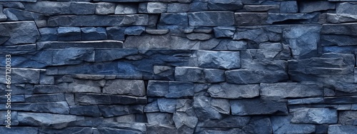 Seamless dark royal blue slate slab rock face background texture. Beautiful abstract grunge rough stone  plaster wall pattern with copy space  business backdrop
