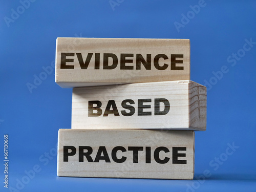 Evidence based practice, text words typography written on wooden blocks, life business and health photo