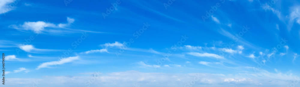 Blue Sky background with tiny Clouds. Panorama background