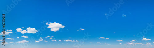 Blue Sky background with tiny Clouds. Panorama background