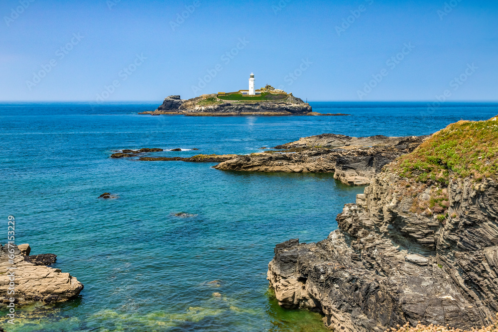 Godrevy Lighthouse, near St Ives, Cornwall, UK, on a bright summer day.