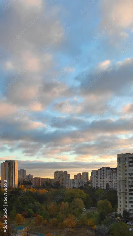 Clouds drift over the morning city. Vertical Video Clouds drift over the morning city. Vertical Video