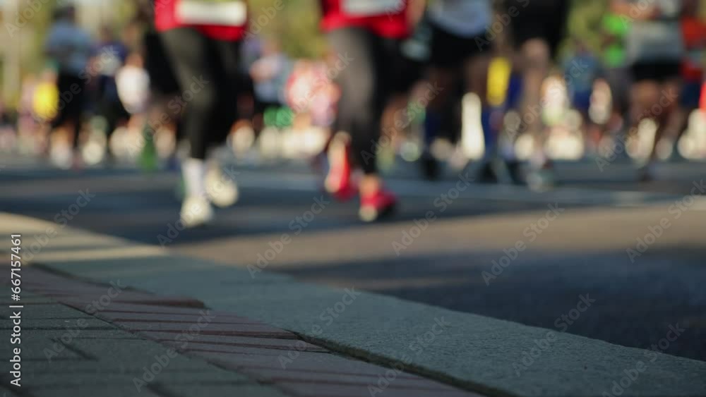 A crowd of people running an amateur marathon. Abstract blurry A crowd of people running an amateur marathon. Abstract blurry