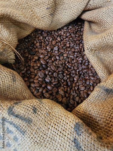 Many brown coffee beans in bag © PixieMe