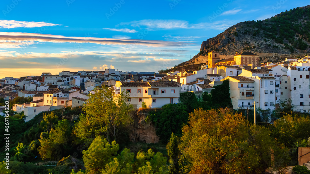 Panoramic view of a white Andalusian village on the hill at sunrise, Velez Blanco, Almeria.