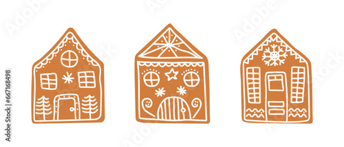 Set of isolated hand drawn gingerbread houses. Traditional Christmas cookies. Vector flat illustration