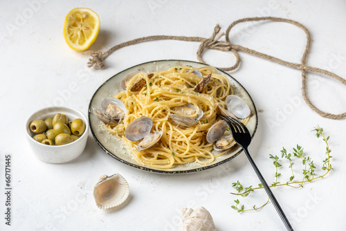 A plate of pasta and vongole shellfish, a traditional dish. Pasta with seafood