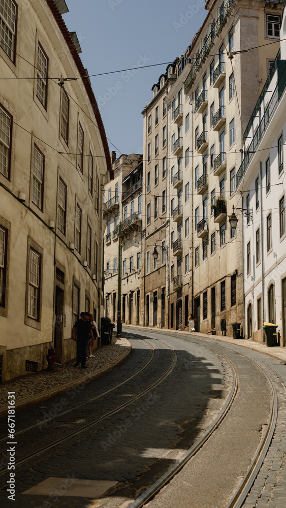 Lisbon, Portugal - May 25, 2023: Narrow street of Lisbon historical center