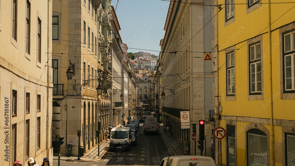 Lisbon, Portugal - May 25, 2023: Perspective of a Lisbon historical center street with traffic 