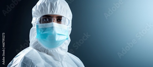 Doctor wearing PPE with N95 or ffp3 mask for fighting COVID 19 photo