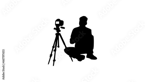 silhouette of a video blogger, a guy sitting in front of the camera
