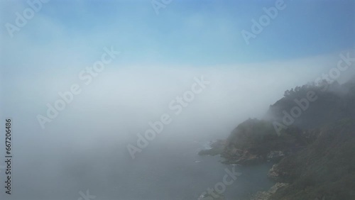 Amazing aerial view on pacific coast highway, route 1 landscape during daytime, above clouds