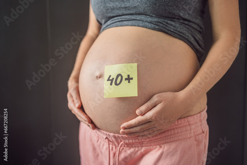 Obraz na płótnie Radiant and confident, a woman in her 40s embraces pregnancy, defying age stereotypes and celebrating the beauty of motherhood w salonie