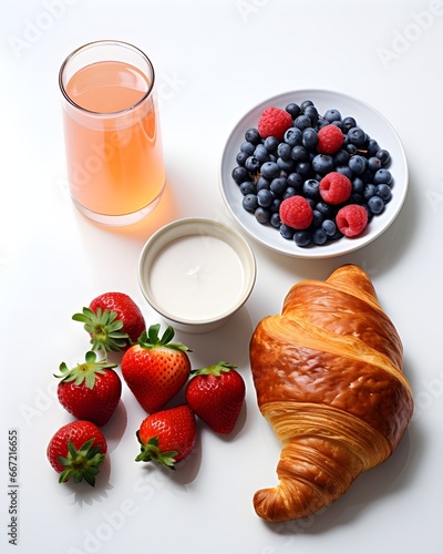 Breakfast with croissant and berries