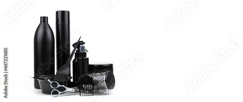 Composition with scissors, other hairdresser's accessories on white background. Professional items for a hairdressers, haircuts on a white background. © Alexa Mat