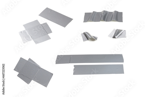 Silver scotch tape pieces isolated on white background.