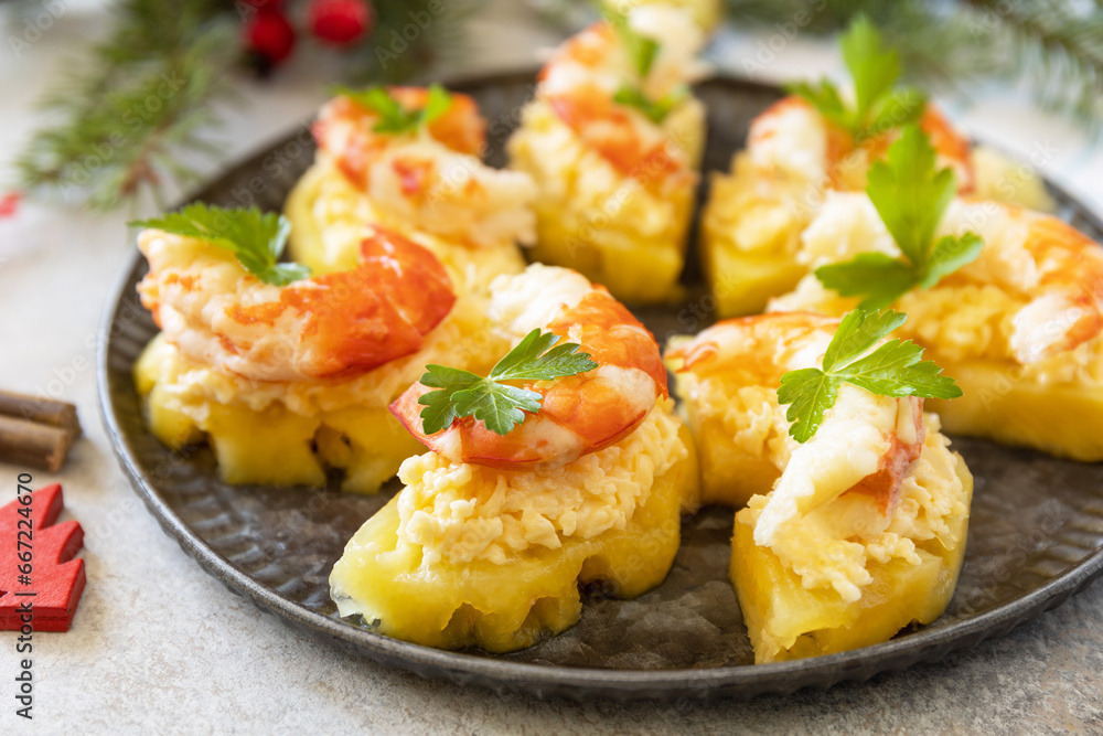 Christmas appetizers. Shrimp on pineapple with cheese filling on the festive table. Christmas appetizers. Shrimp on pineapple with cheese filling on the festive table.