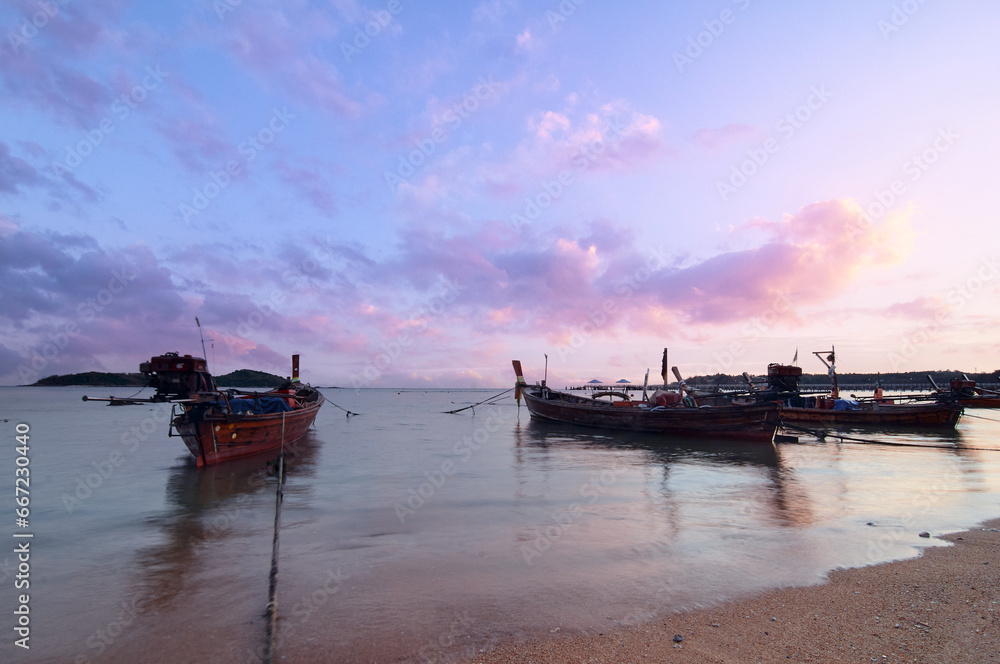 Beautiful landscape with traditional longtail boat on the beach. Phuket, Thailand. Beautiful landscape with traditional longtail boat on the beach. Phuket, Thailand.