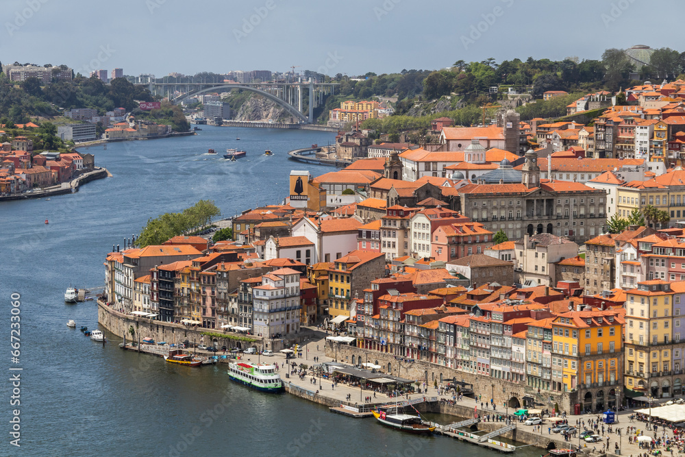 Porto, Portugal - May 13, 2018: Traditional architecture of the urban center of the city of Porto with the Douro river, Portugal.