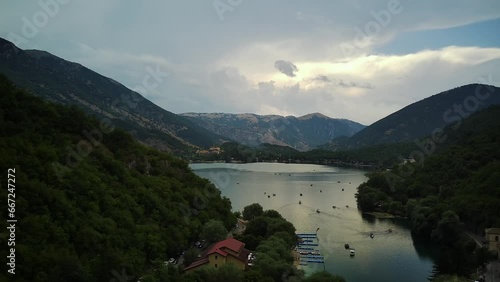 The beach of the bay with clear water. catamarans float on the lake. Aerial drone view, Abruzzo Italy. photo