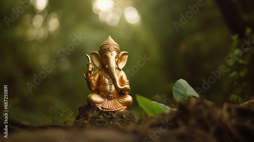  Golden lord ganesha sculpture on nature background. celebrate lord ganesha festival. 