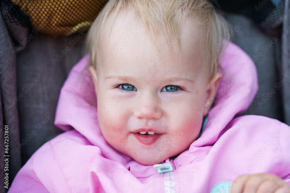 Close-up portrait of blonde caucasian kid baby with blue eyes Close-up portrait of blonde caucasian kid baby with blue eyes