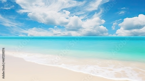 Beautiful sandy beach background. Bright summer sun over the ocean.Blue sky with light clouds  turquoise ocean with surf and clear white sand.